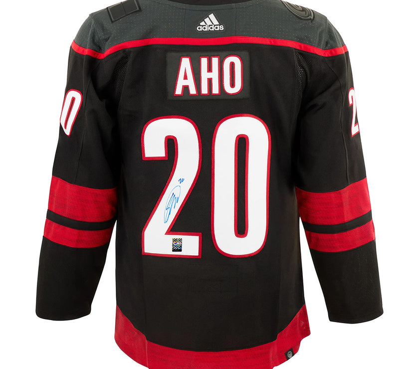 Sebastian Aho Signed Carolina Hurricanes Adidas Pro Home Black Jersey